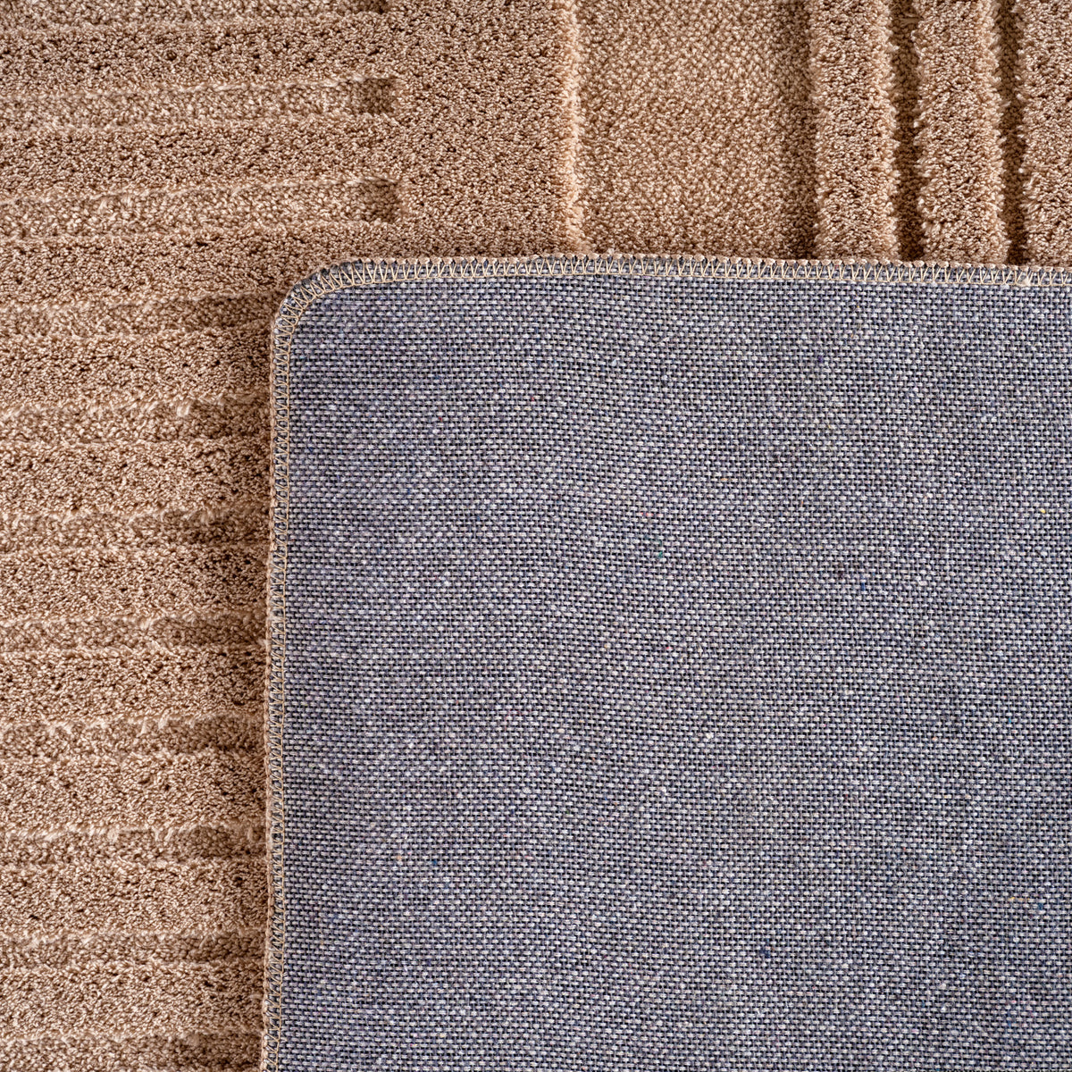 Pia 1612 beige · Moderner Teppich mit geschwungenem Linienmuster