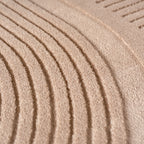 Pia 1612 beige · Moderner Teppich mit geschwungenem Linienmuster