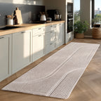 Pia 1612 creme · Moderner Teppich mit geschwungenem Linienmuster