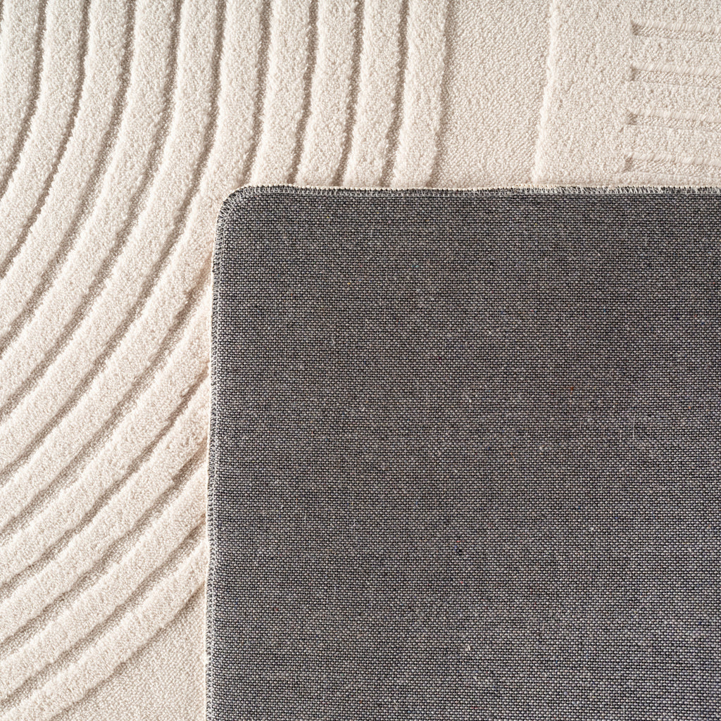 Pia 1612 creme · Moderner Teppich mit geschwungenem Linienmuster
