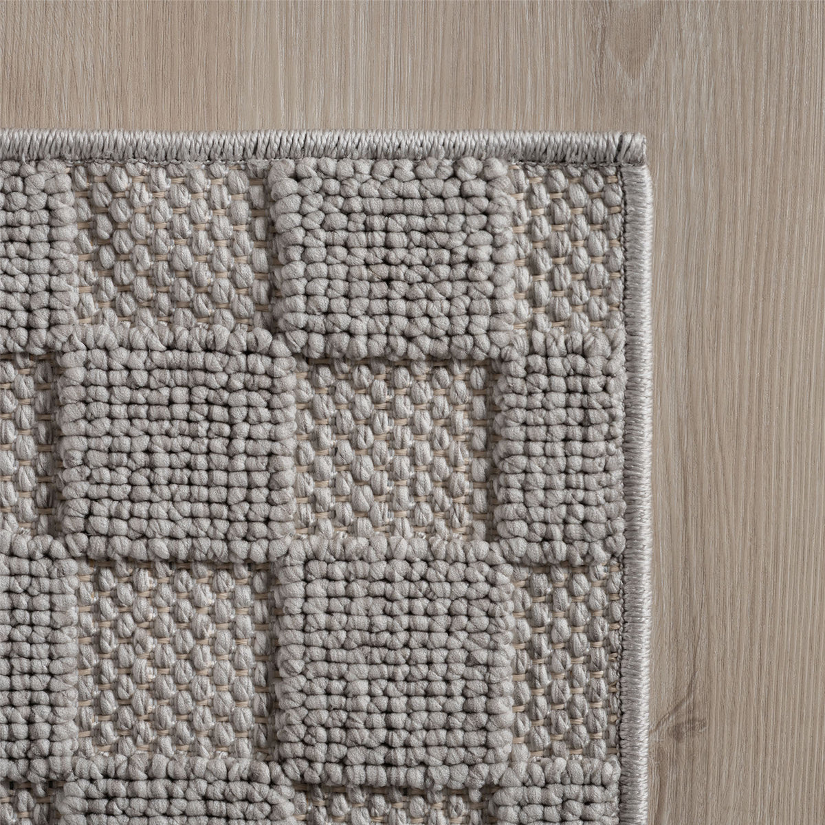 Hira 2203 grau · Moderner Strukturteppich mit geometrischem 3D-Rautenmuster