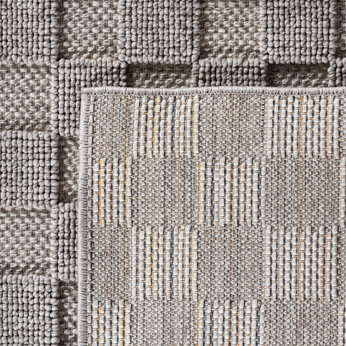 Hira 2203 grau · Moderner Strukturteppich mit geometrischem 3D-Rautenmuster